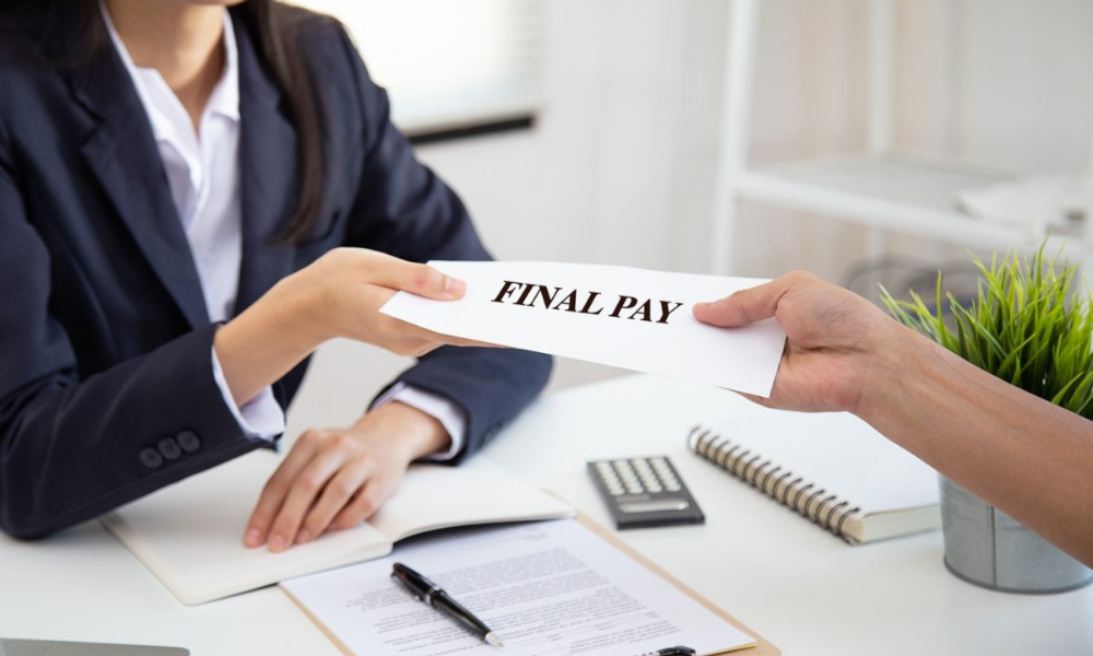 Buyer making final property payment and settling additional fees in the UAE